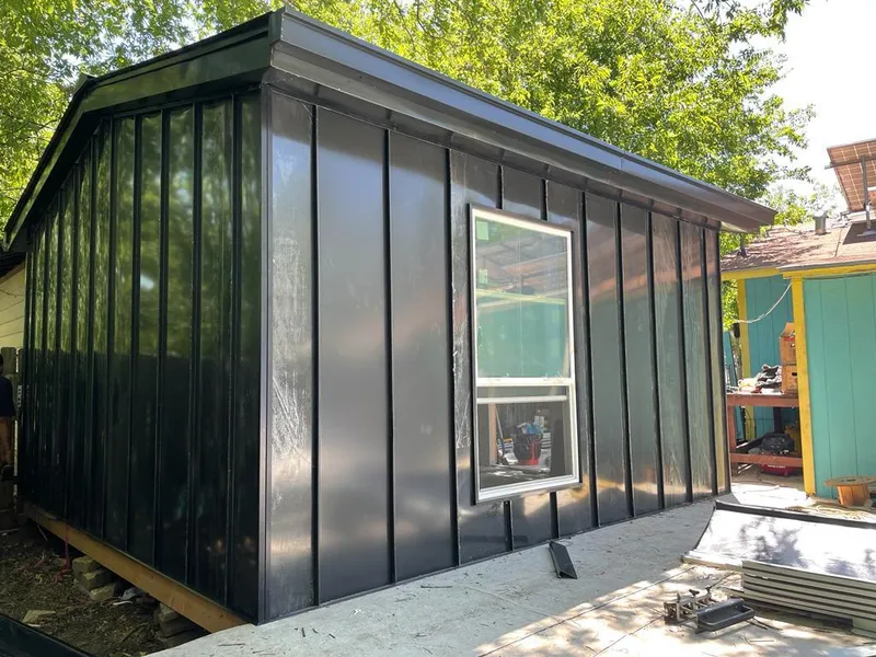 Black standing seam metal wall panels for Metal Roof Installation in Commerce